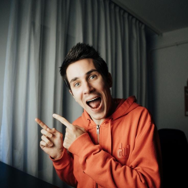 Aisha Rao, Lead Design Curator at Azure Meadow Rift, reviewing corporate floral arrangements